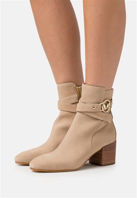 michael kors ankle boot with gold buckles|Michael Kors cowboy boots.